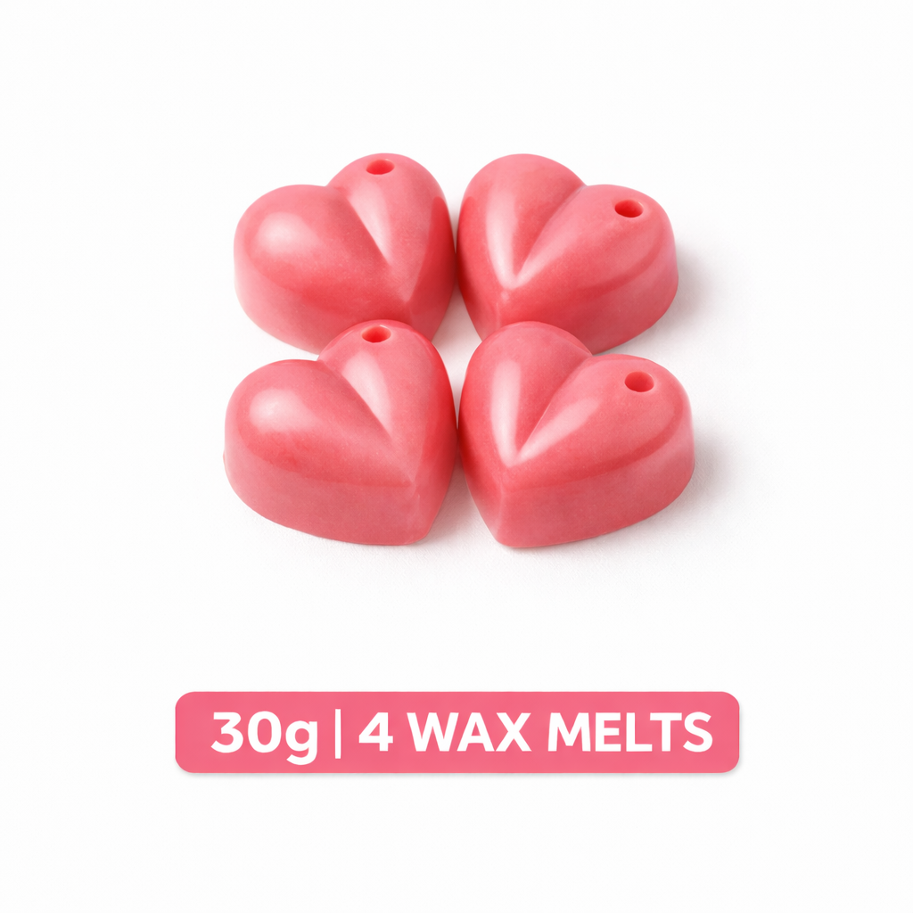 Four pink heart-shaped wax melts on a white background with text indicating weight and quantity.