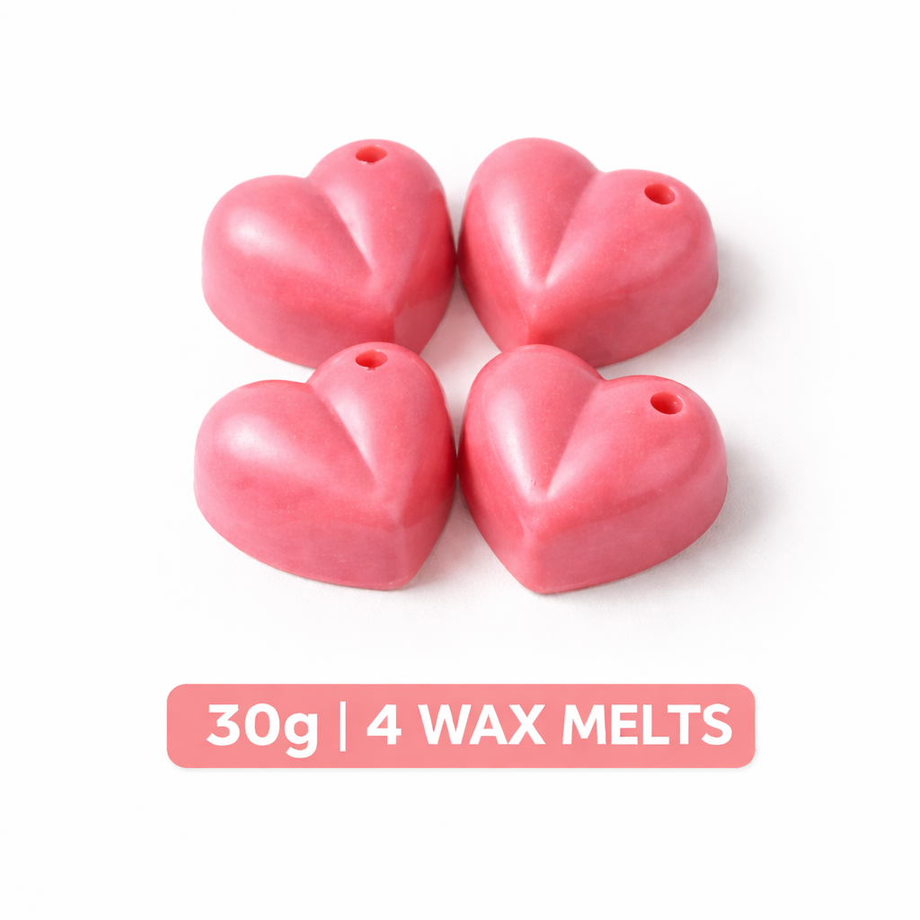 Four pink heart-shaped wax melts on a white background with text indicating weight and quantity.
